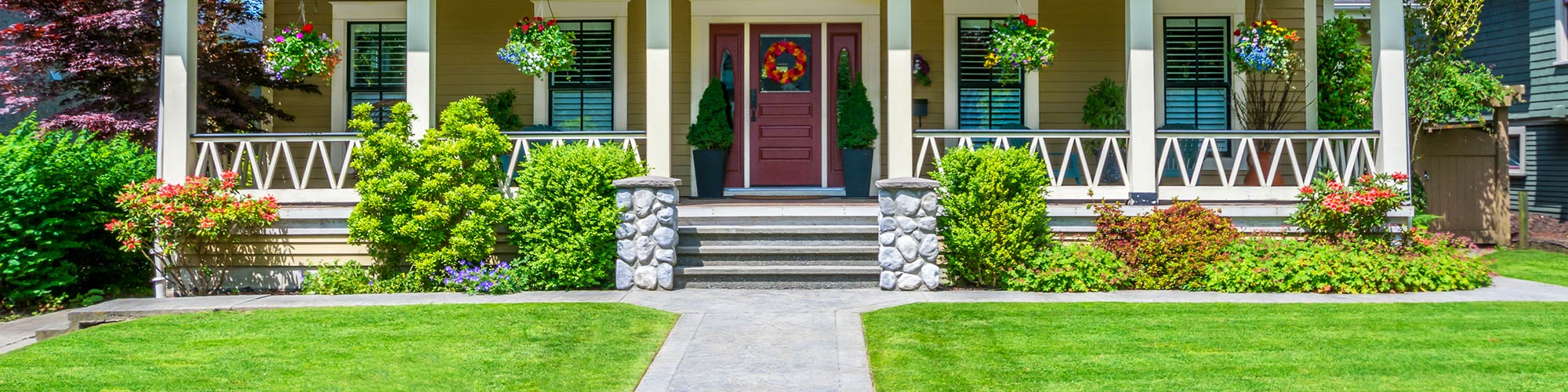 Gorgeous front lawn after landscape maintenance in Falls Church, VA.
